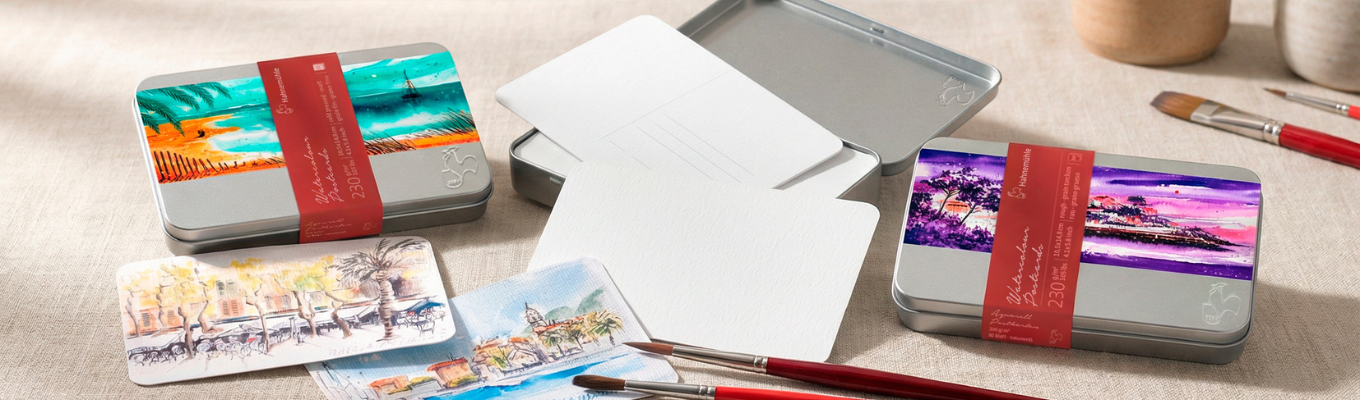 metal tin, art postcards, paint brushes, travel scenes, snack cards