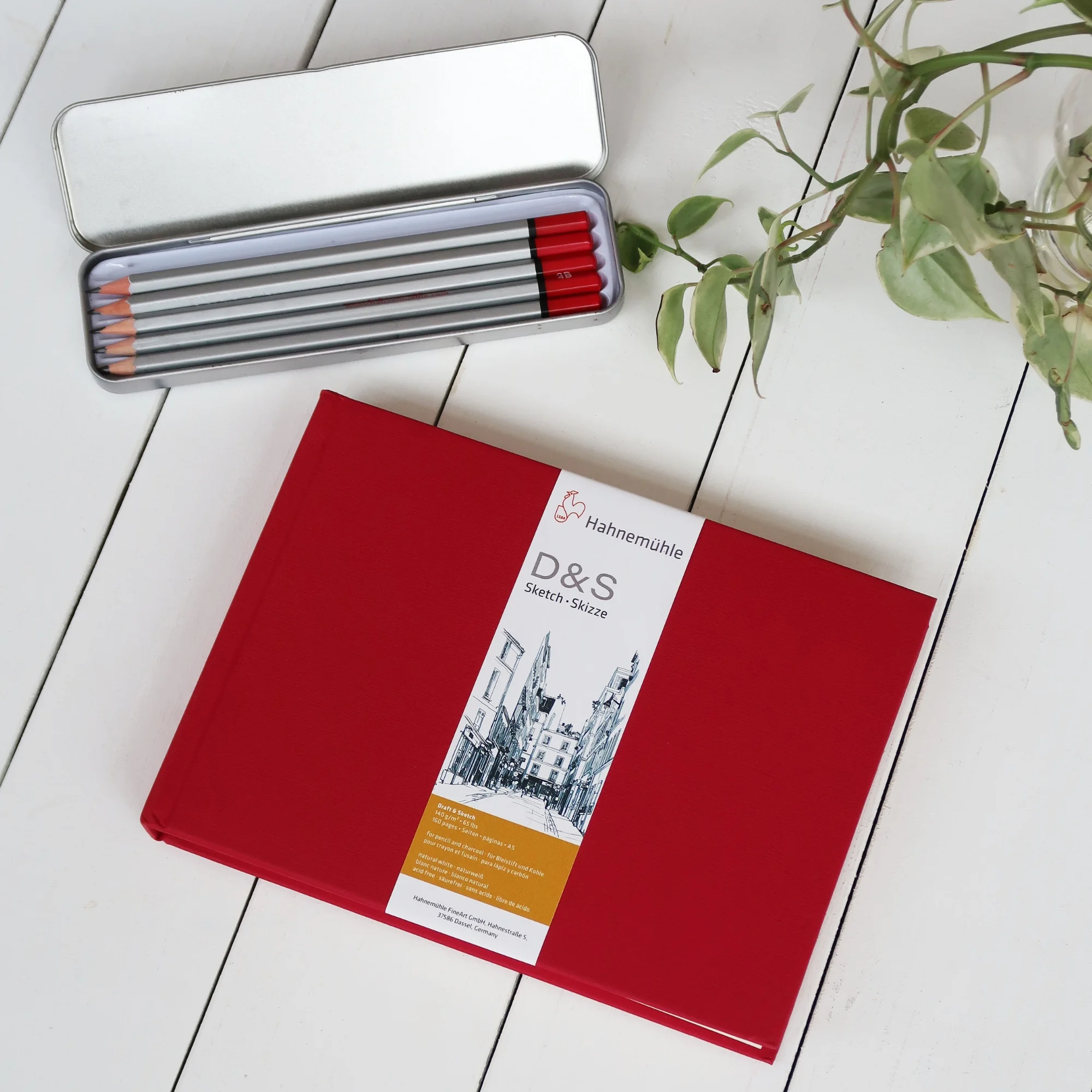 red sketchbook, gift set, pencil tin, colored pencils, stationery